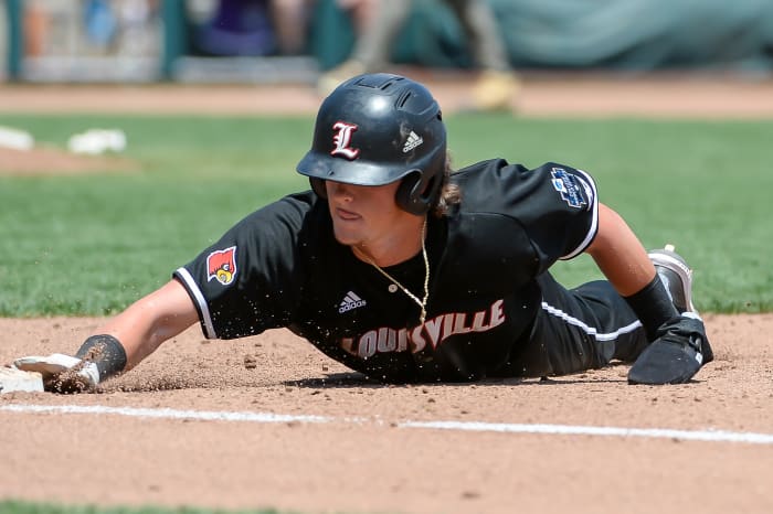 SF Giants prospect Tyler Fitzgerald diving back to first base during his college career at Louisville.